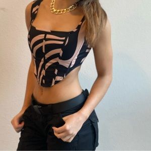 Pink and black swirly corset top